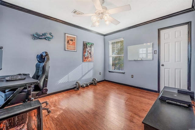 office space with light hardwood / wood-style flooring, ceiling fan, and crown molding