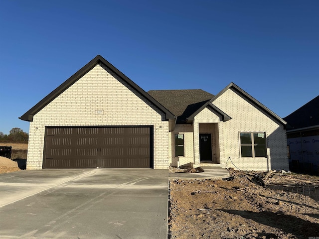 view of front of property featuring a garage