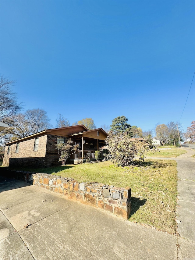 view of front of property with a front lawn