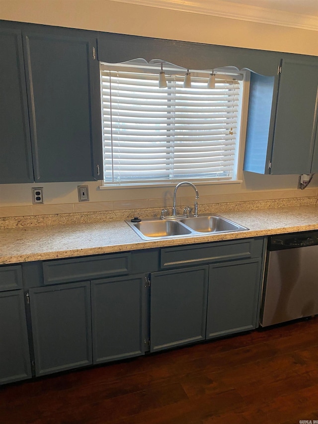 kitchen featuring dishwasher, dark hardwood / wood-style flooring, crown molding, and sink