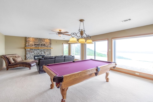 playroom with carpet flooring, ceiling fan, a fireplace, and billiards