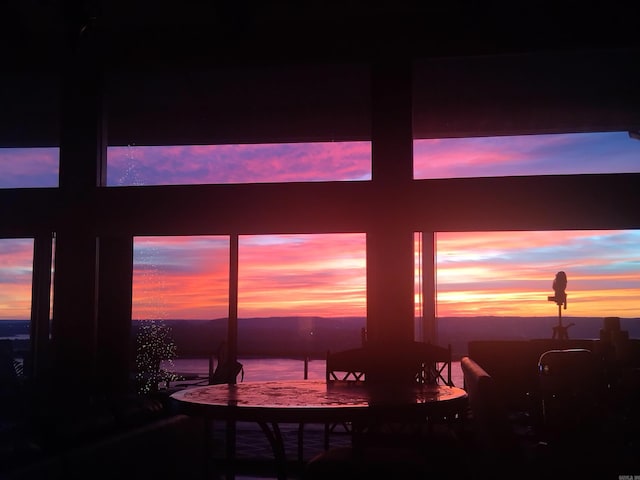 dining area with a water view