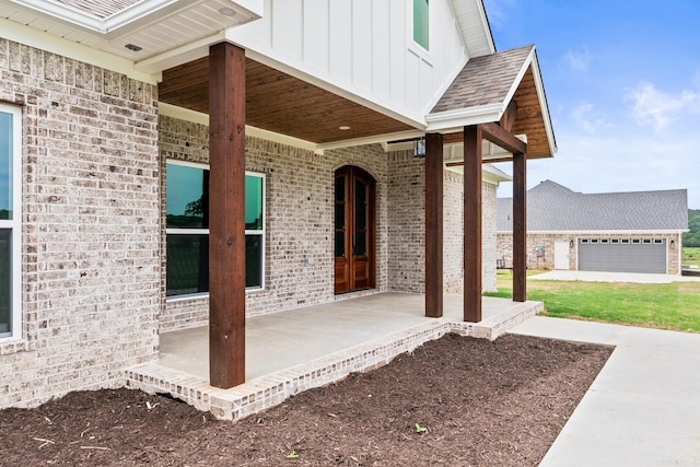 view of patio featuring a garage