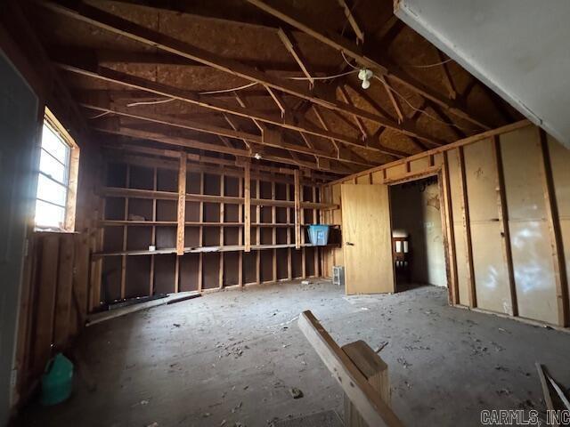 misc room with vaulted ceiling