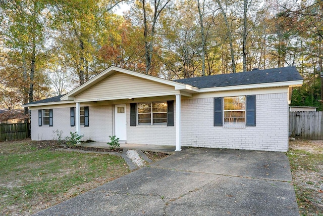 single story home with covered porch