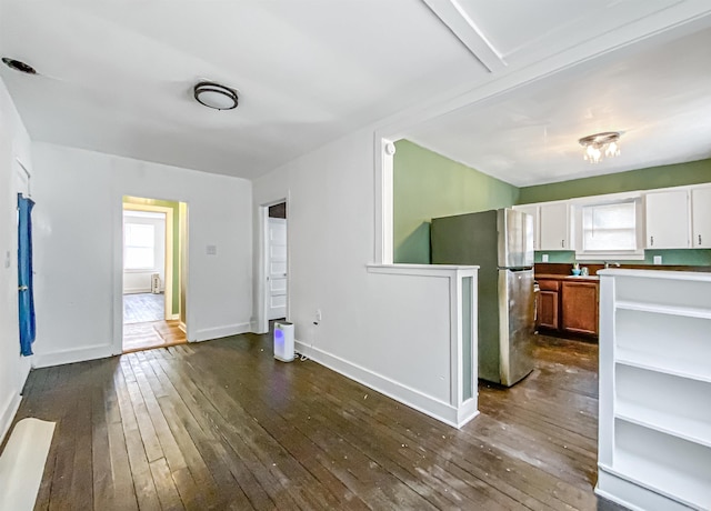 interior space with dark hardwood / wood-style flooring