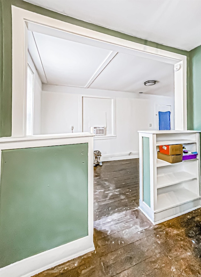 clothes washing area with an AC wall unit