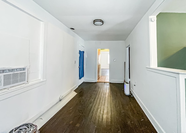 hall featuring dark hardwood / wood-style flooring and cooling unit