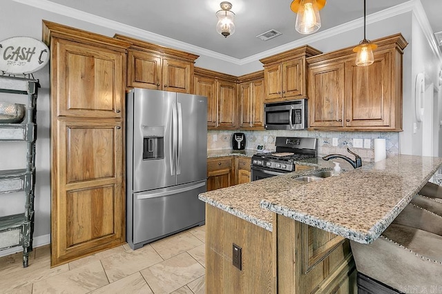 kitchen with a breakfast bar, kitchen peninsula, stainless steel appliances, and ornamental molding