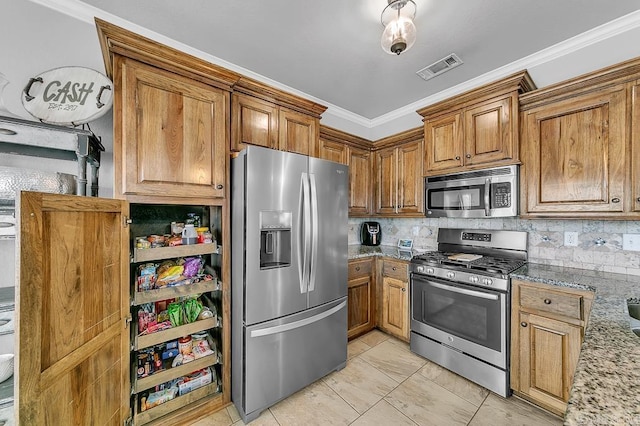 kitchen featuring stone counters, decorative backsplash, stainless steel appliances, and ornamental molding