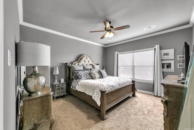 bedroom featuring a textured ceiling, ceiling fan, ornamental molding, and light carpet