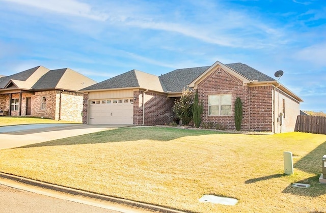 view of front of property featuring a front lawn and a garage