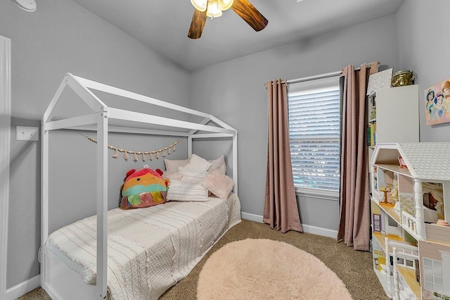 bedroom with light colored carpet and ceiling fan