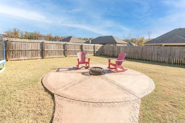 view of patio / terrace with a fire pit