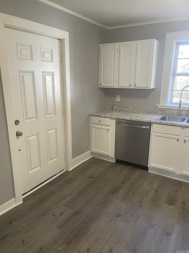 kitchen with crown molding, sink, stainless steel dishwasher, dark hardwood / wood-style flooring, and white cabinetry