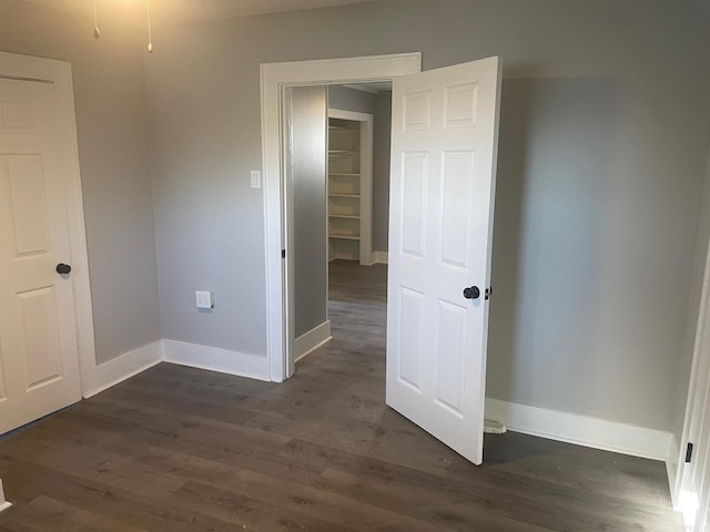 interior space with dark wood-type flooring