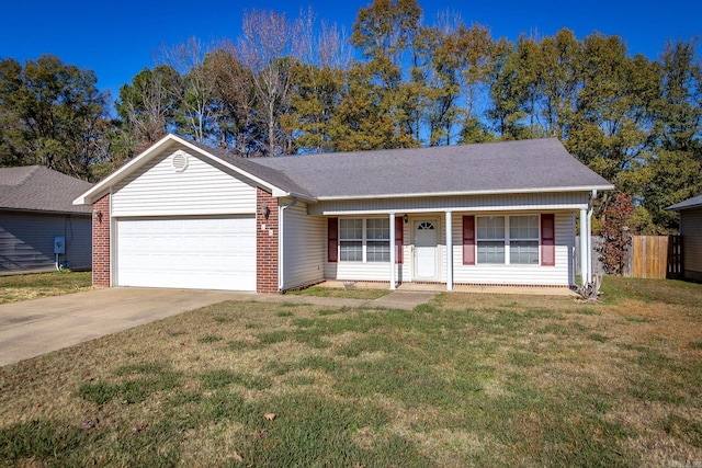 ranch-style home featuring a garage and a front lawn