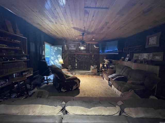 living room featuring a stone fireplace and wood ceiling