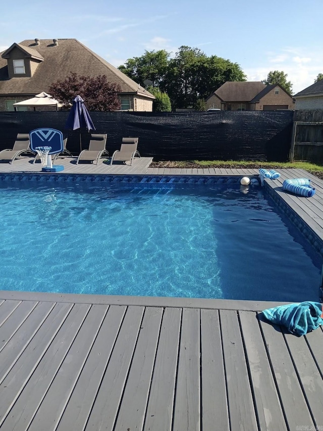 view of pool with a deck