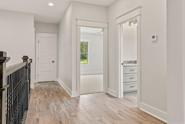 corridor featuring light hardwood / wood-style flooring