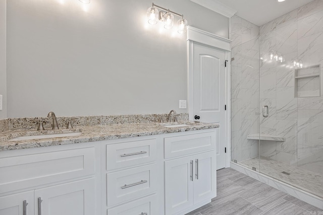 bathroom featuring vanity and a shower with shower door