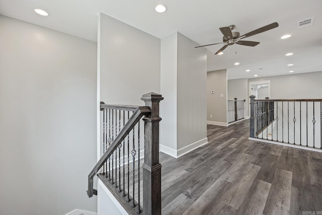 corridor with dark hardwood / wood-style floors