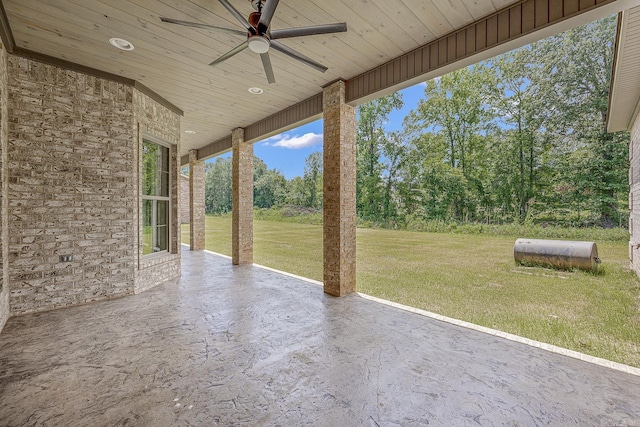 view of patio featuring ceiling fan