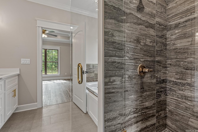 bathroom featuring ornamental molding, vanity, ceiling fan, hardwood / wood-style flooring, and plus walk in shower