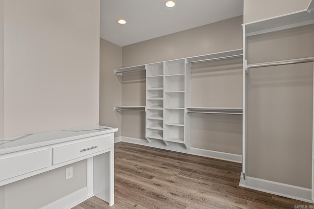 walk in closet featuring wood-type flooring