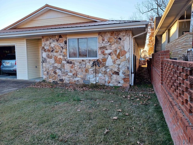 view of property exterior featuring a yard