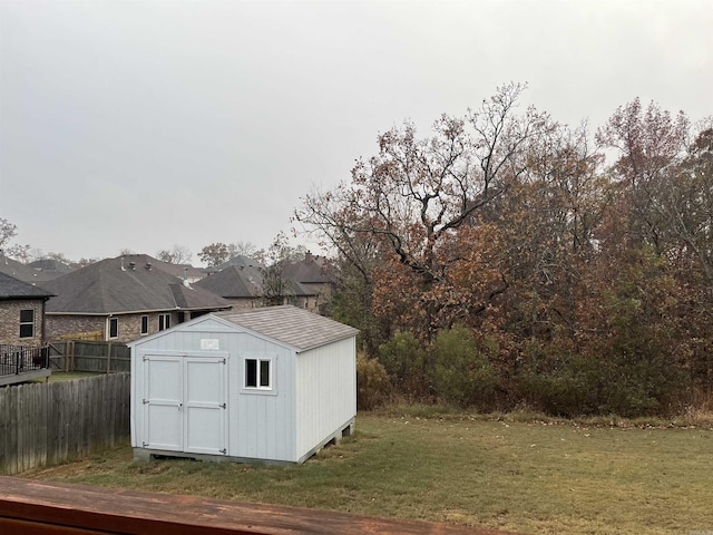 view of outdoor structure featuring a yard