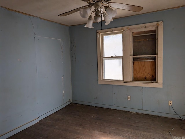 unfurnished room featuring dark hardwood / wood-style flooring and ceiling fan