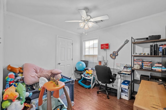 office space with ceiling fan, ornamental molding, and dark wood-type flooring