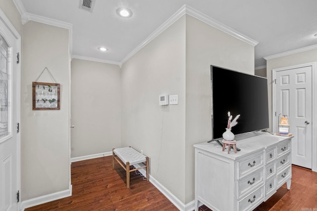 hall featuring crown molding and dark hardwood / wood-style flooring