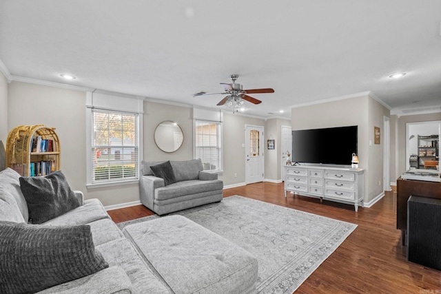 living room with ceiling fan, crown molding, and dark wood-type flooring