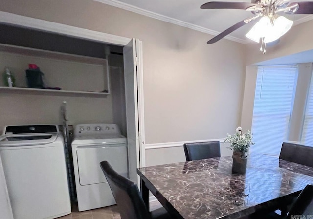 dining area with crown molding and washer and dryer