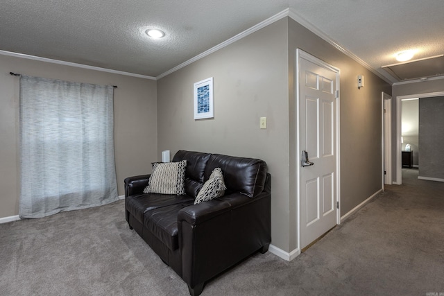 carpeted living room featuring ornamental molding and a textured ceiling