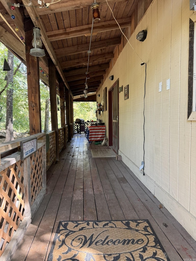 wooden terrace with covered porch