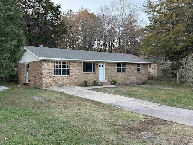 ranch-style home with a front lawn