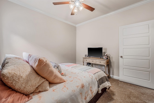 carpeted bedroom with ceiling fan and crown molding