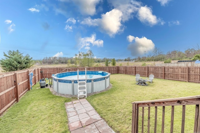 view of yard featuring a fenced in pool