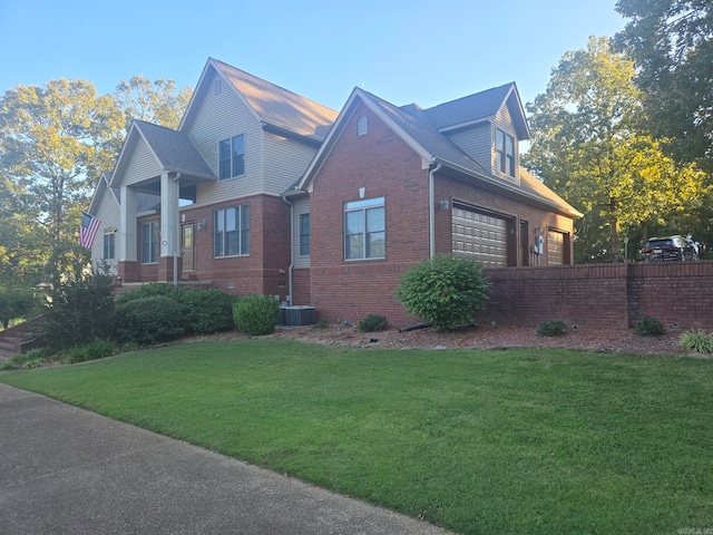 view of home's exterior with central AC, a garage, and a lawn