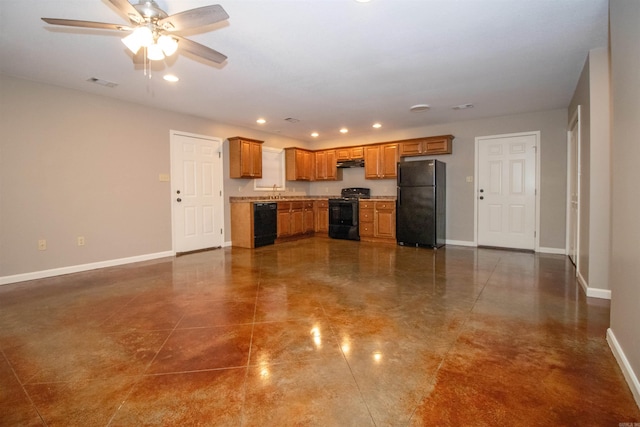 kitchen with dark tile patterned floors, ceiling fan, and black appliances