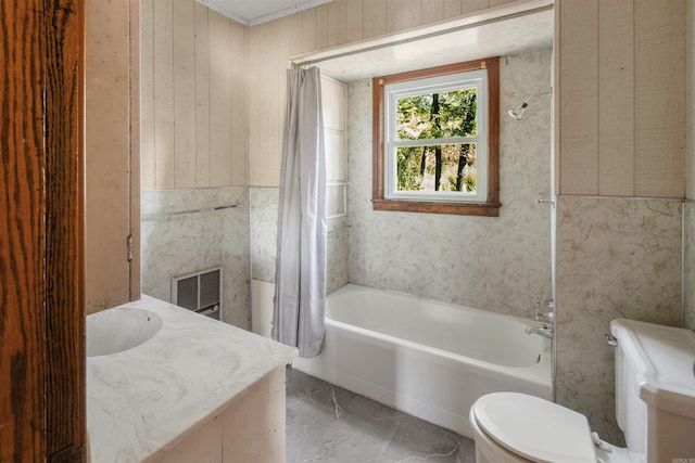 full bathroom featuring shower / bath combination with curtain, vanity, toilet, and wooden walls