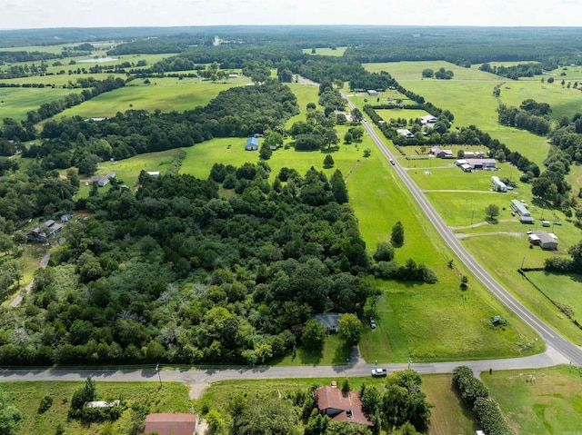 birds eye view of property featuring a rural view