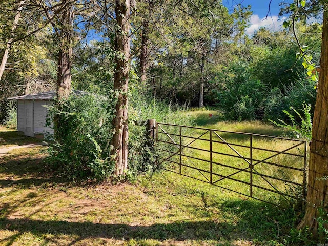 view of gate with a storage unit