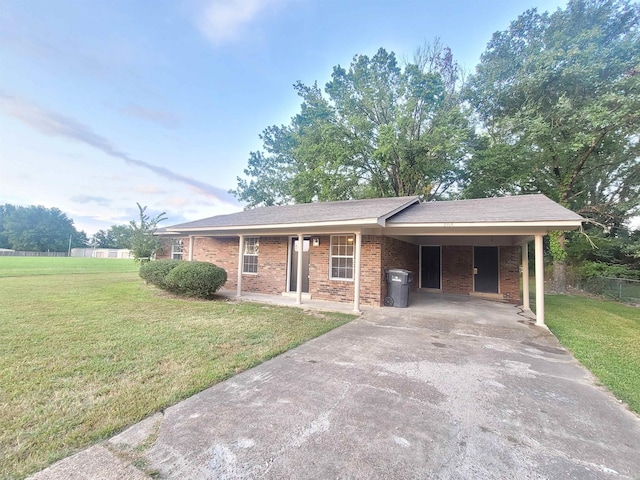 ranch-style house with a front lawn and a carport