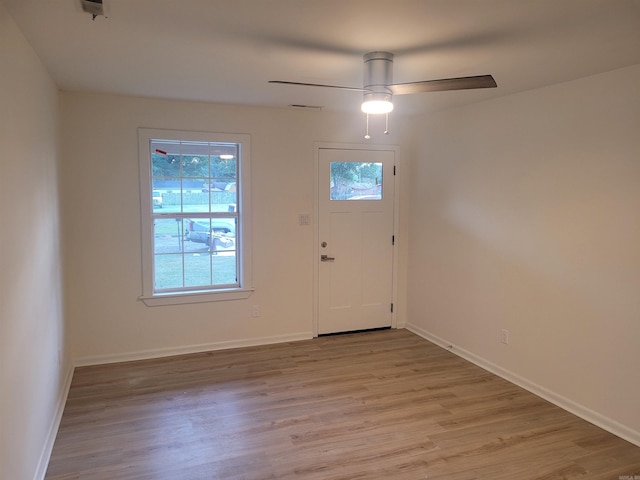 foyer entrance featuring light hardwood / wood-style flooring and ceiling fan