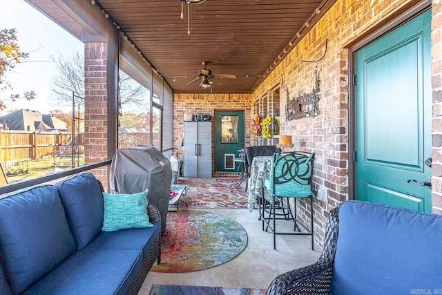 view of patio / terrace featuring ceiling fan