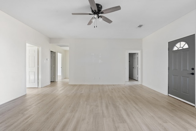 unfurnished living room featuring light wood-type flooring and ceiling fan